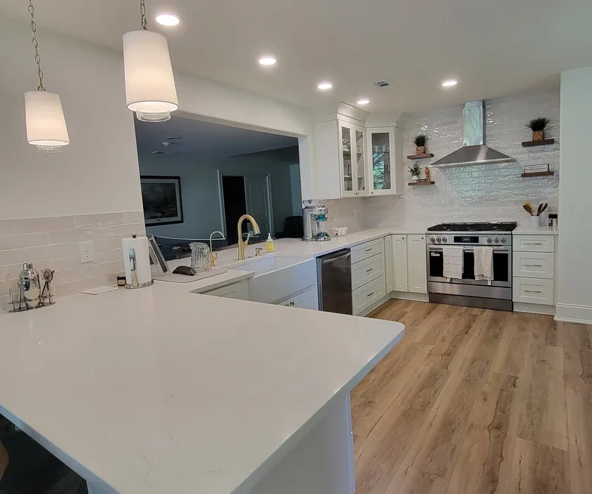Kitchen remodel with island, new cabinetry and hardwood flooring