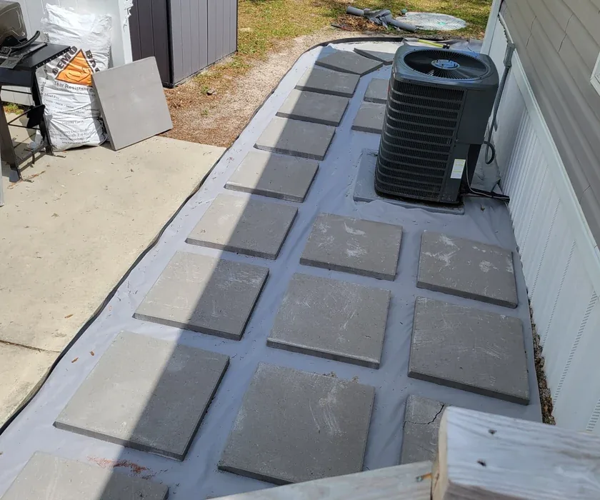 Handyman completing a home repair project in Charlotte, NC