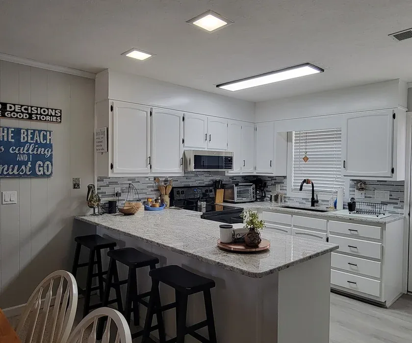 Kitchen remodel with island, new cabinetry and hardwood flooring