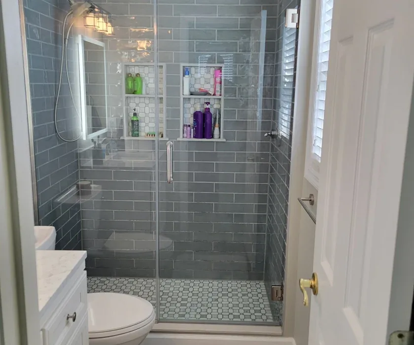 Guest bathroom remodel with ceramic tile floor, vanity and stone countertop